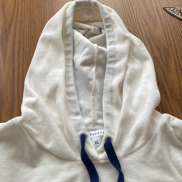 Cream hoodie with navy drawstring and star on left sleeve. Size XL. - Picture 8 of 9
